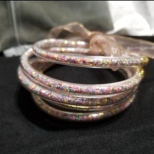 5 Multicolored Plastic Bead Filled Bracelets